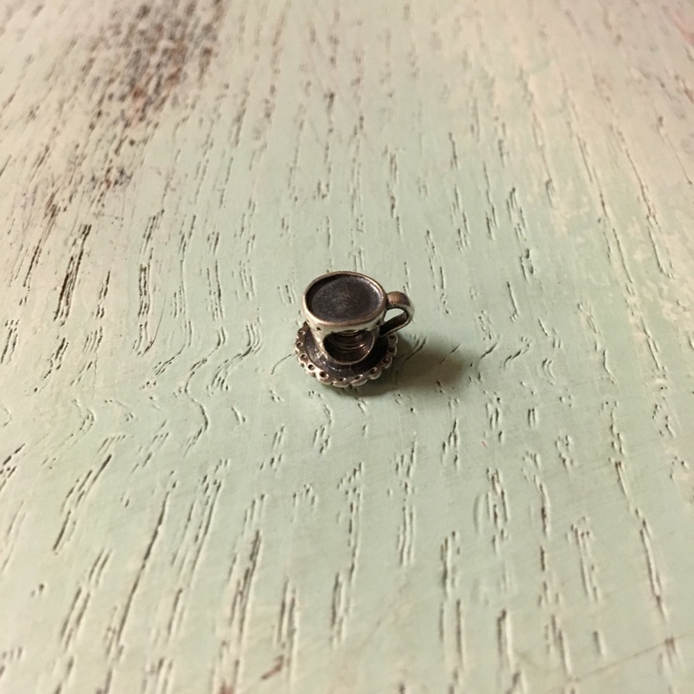 Retired Pandora Teacup and Saucer Charm.